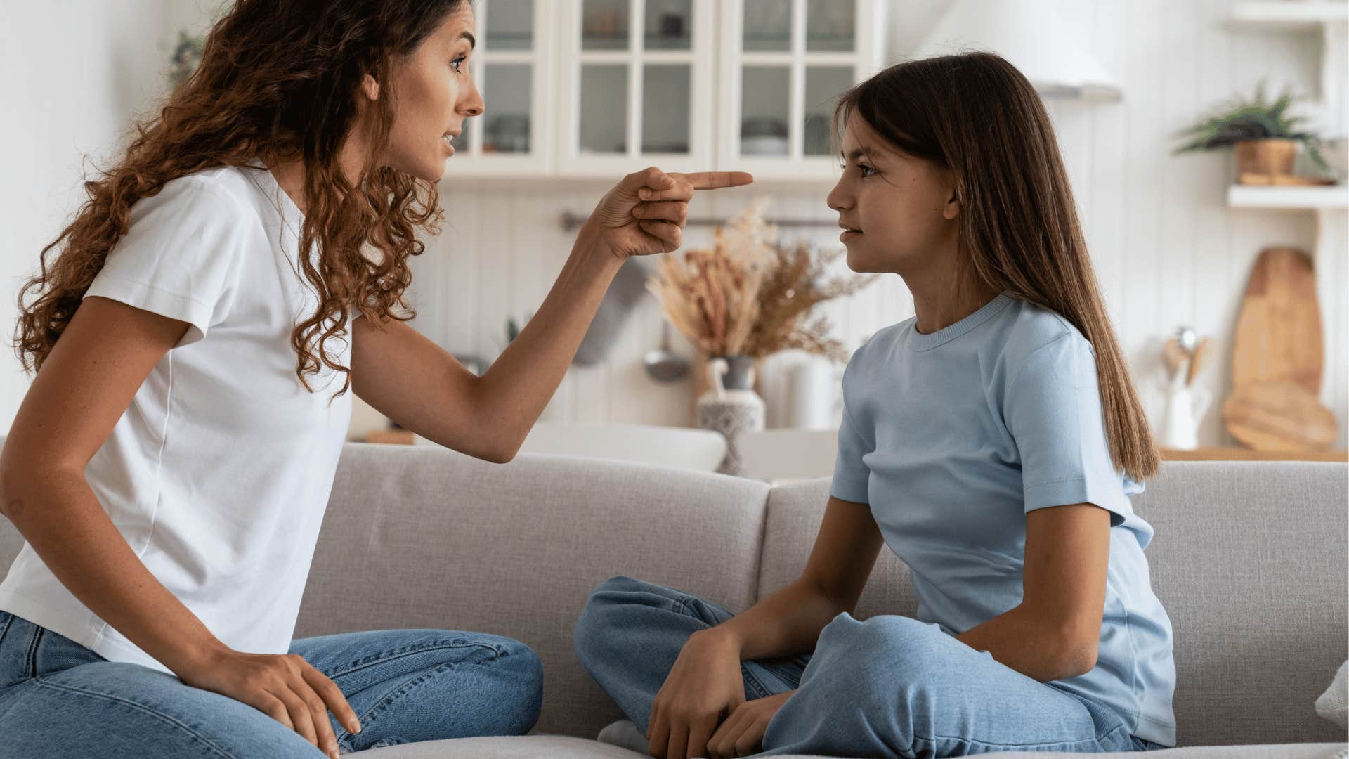 narcissistic mom scolding young daughter