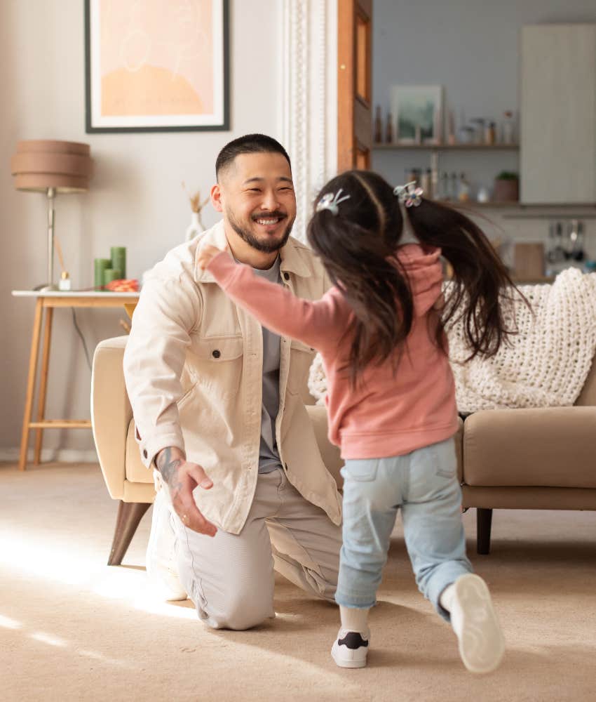 daughter greeting dad coming home from work