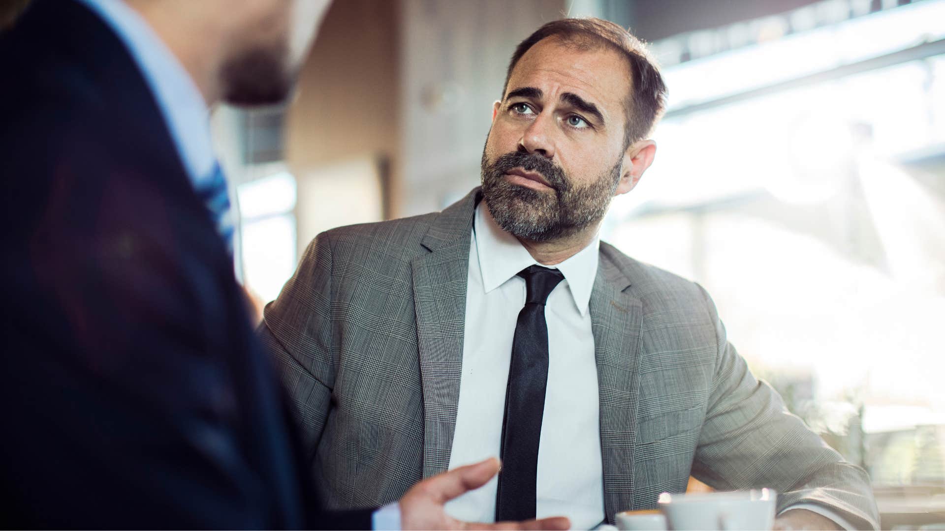 Man making assumptions about silence at work.