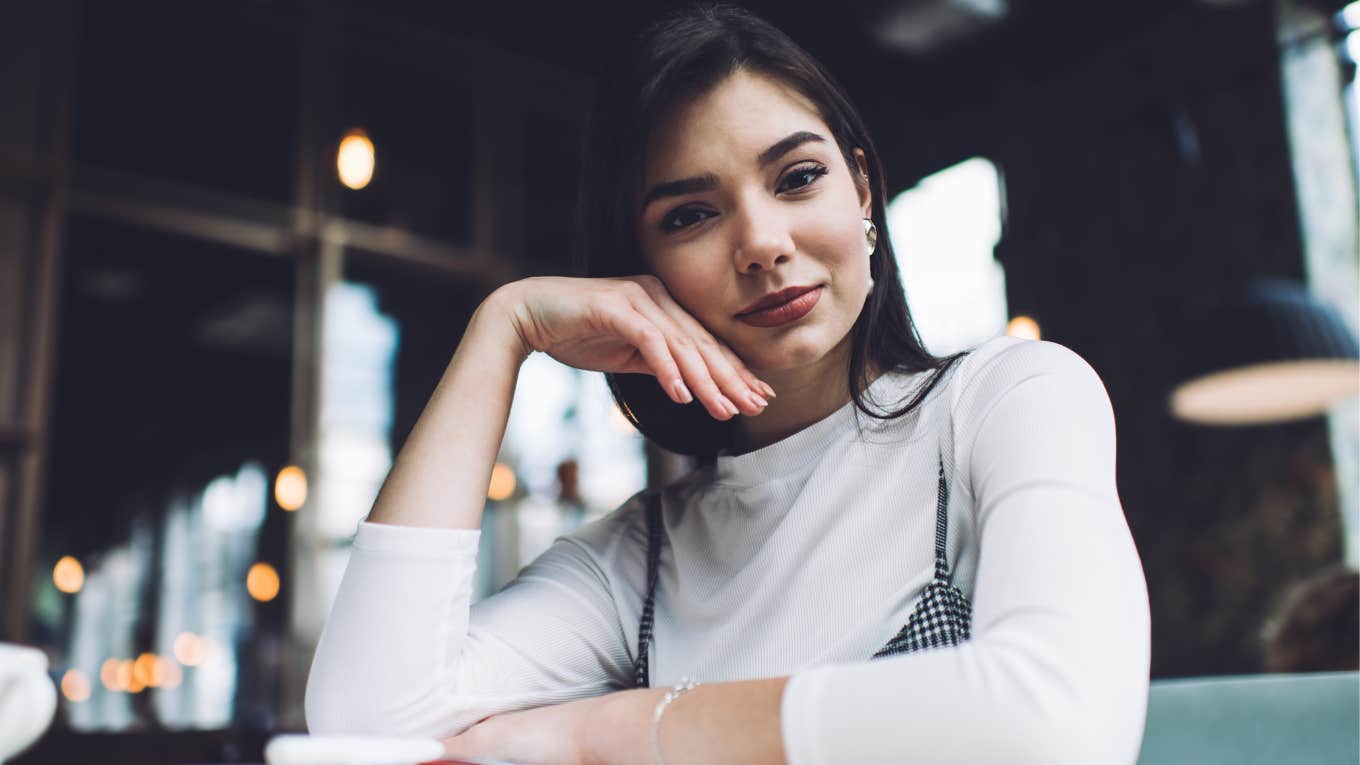 woman with unusually high intelligence smiling while doing work