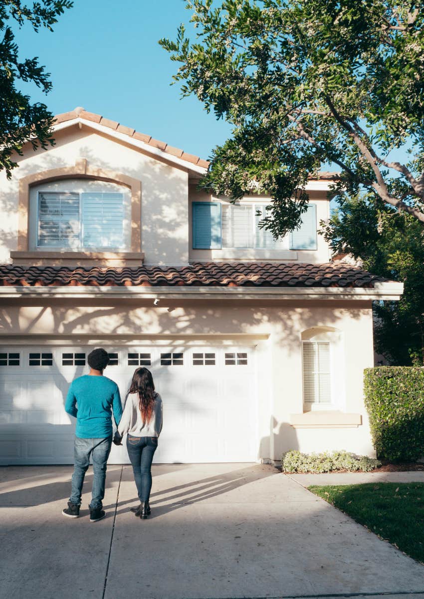 couple who are homeowners in a neighborhood with an HOA