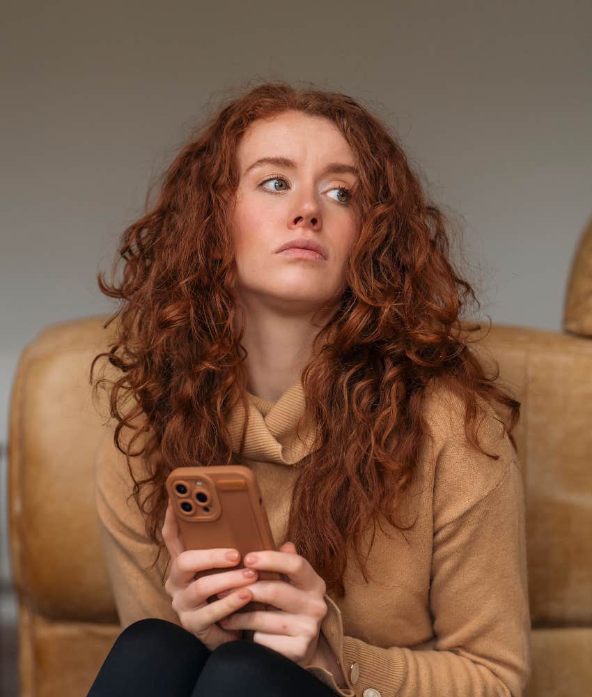 Bothered person with phone showing need to acknowledge emotion is a skill 