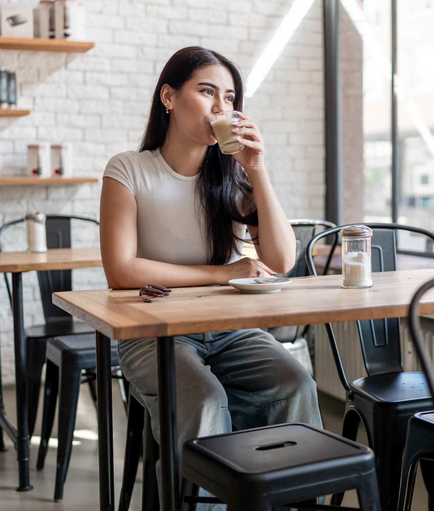 Calm person sips a drink showing reaction is emotional skill