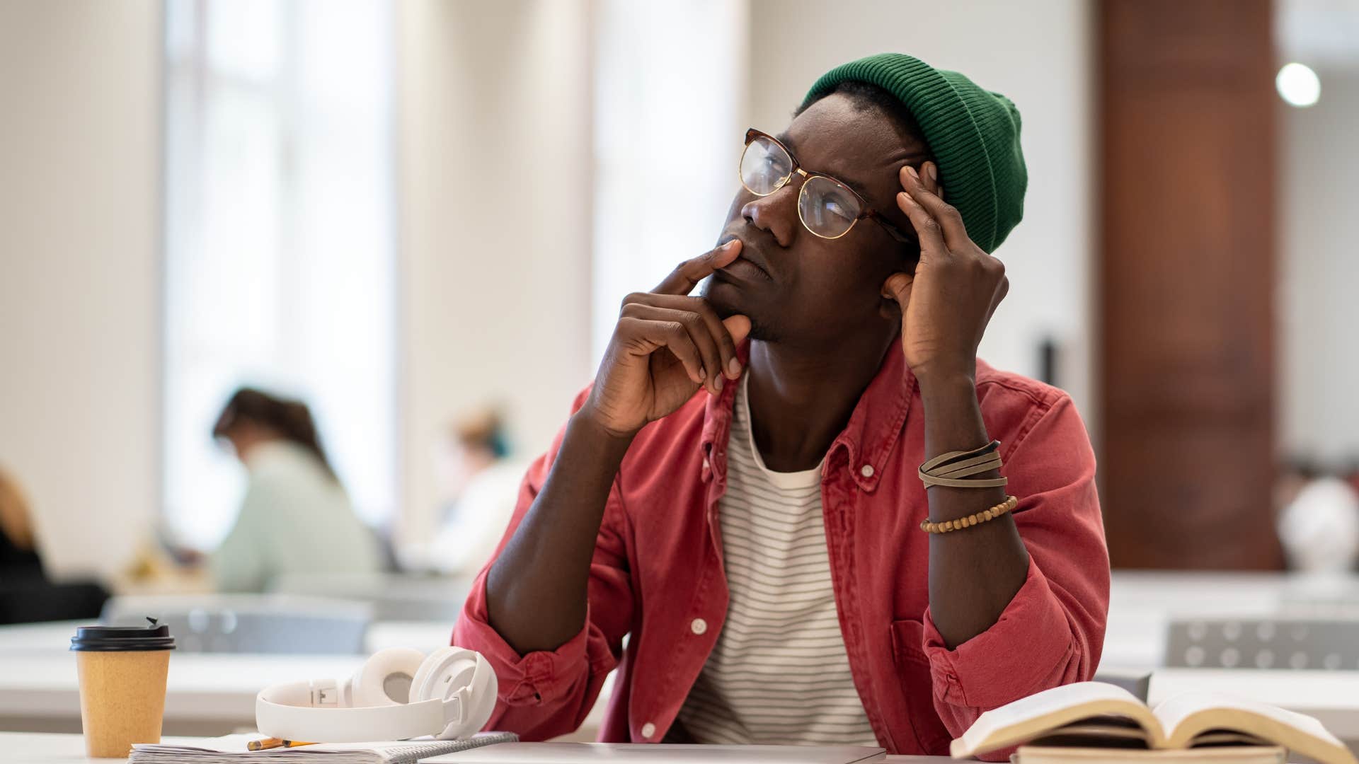 man distracting himself when feeling discomfort