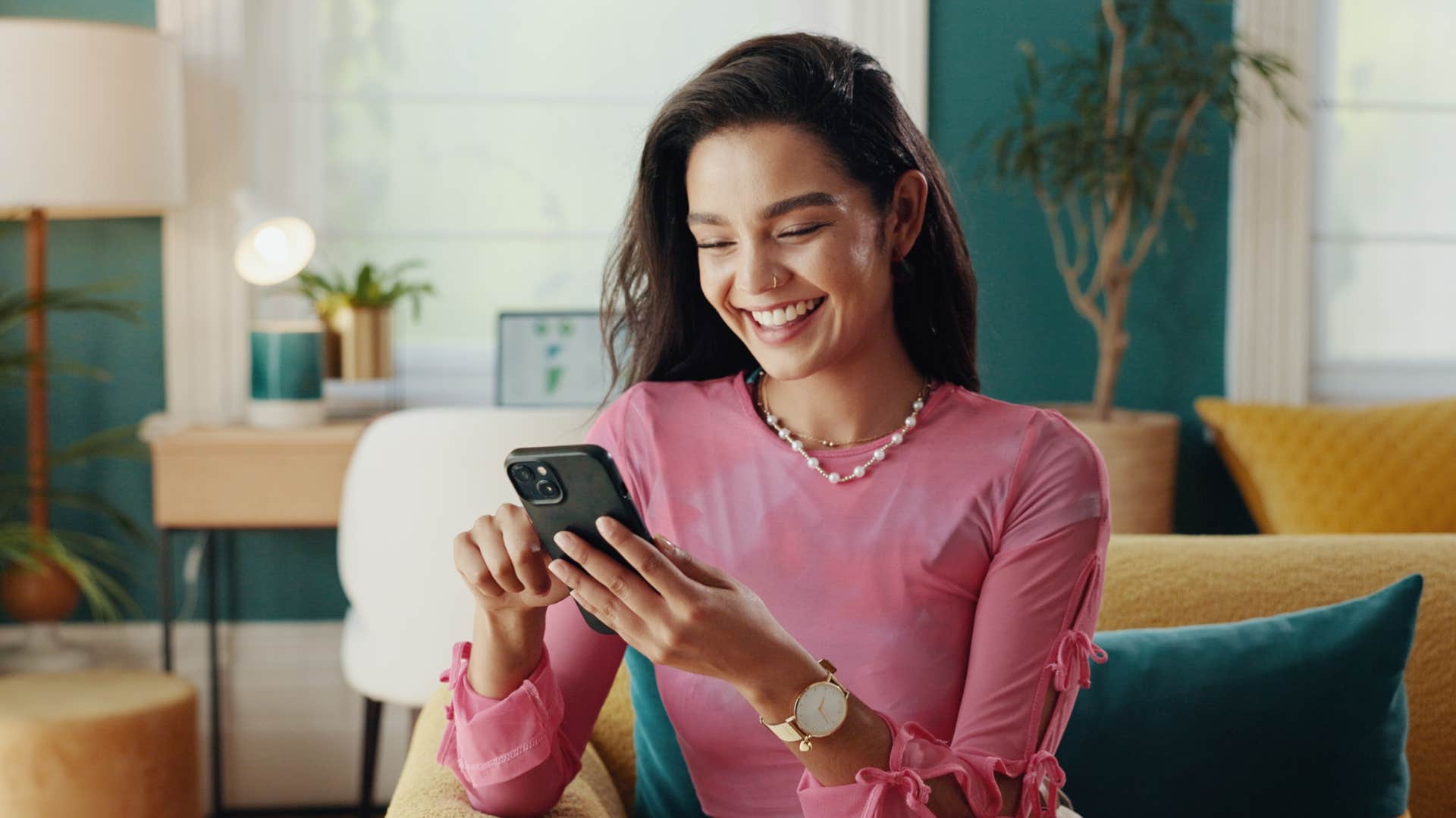 woman on her phone balancing online sharing with personal privacy