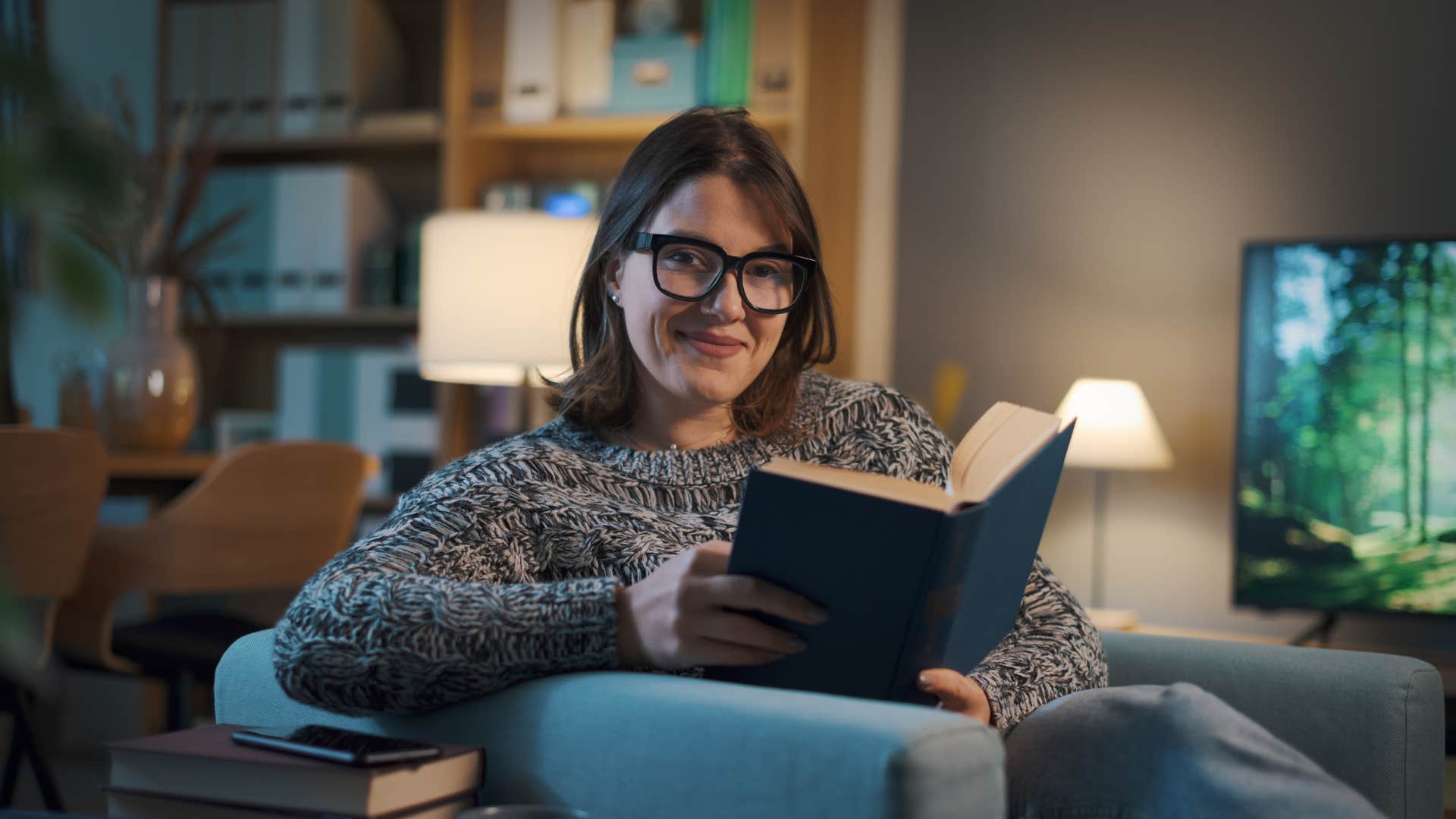 woman reading book comfortable with silence