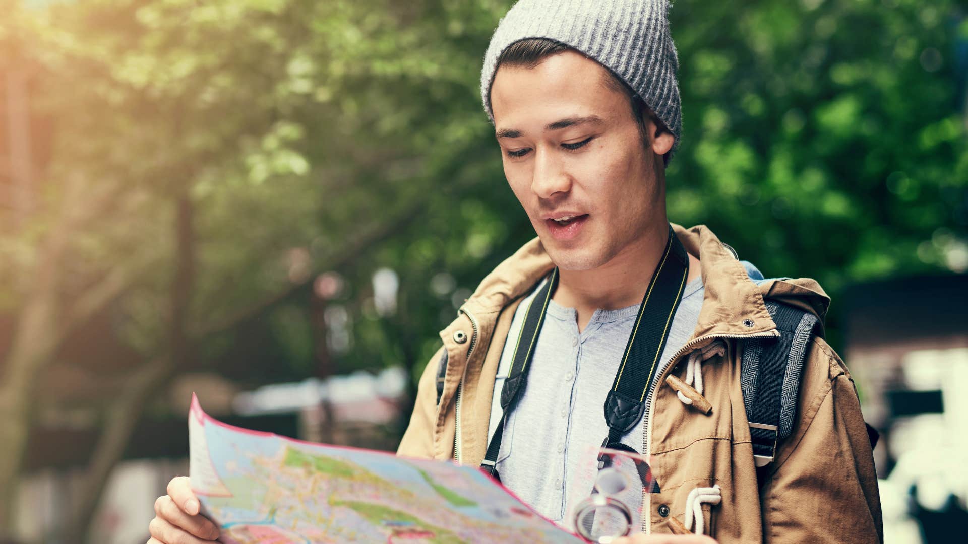 man looking at map to navigate