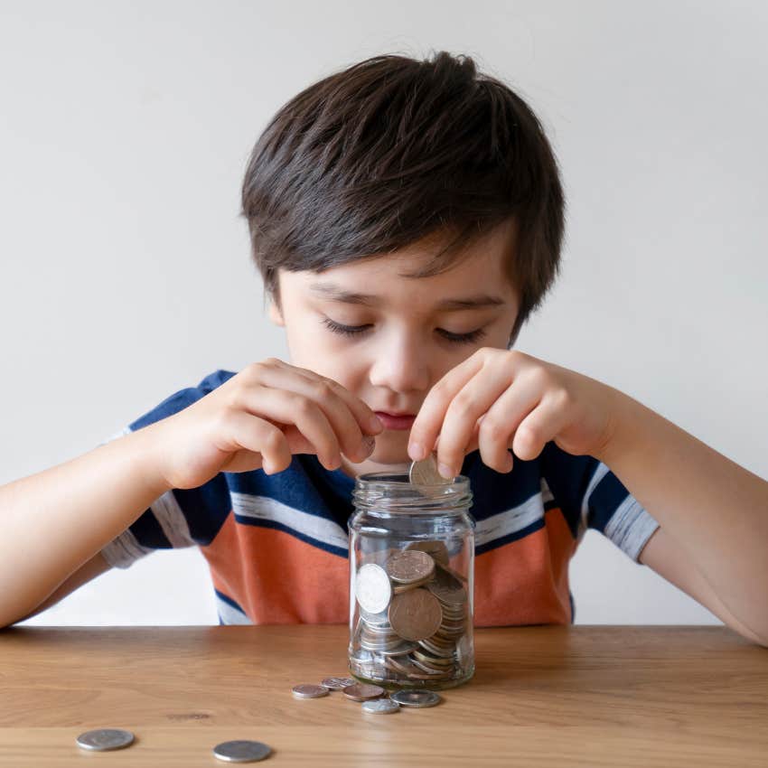 Little boy saving money for the things they wanted.