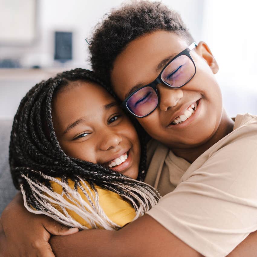 Kid babysitting their sibling at home