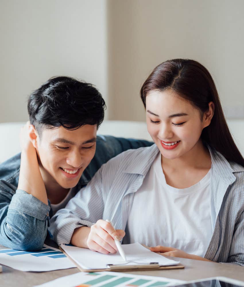 Happy extrovert makes plan with introvert showing importance of slowing down