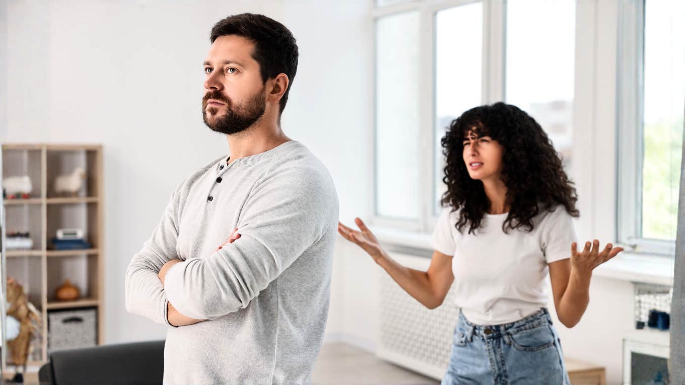 Emotional couple arguing at home showing the facial expression that predicts divorce with 93.6% accuracy.
