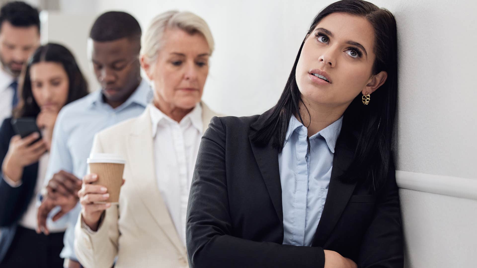 impatient woman waiting on line for her turn