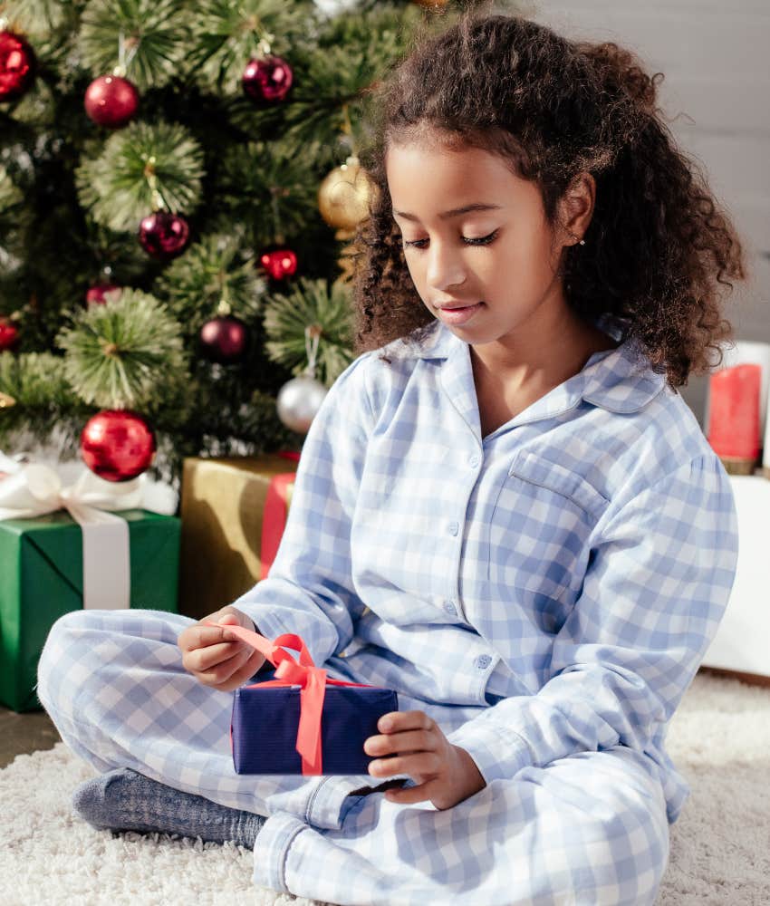 child receiving Angel Tree gift