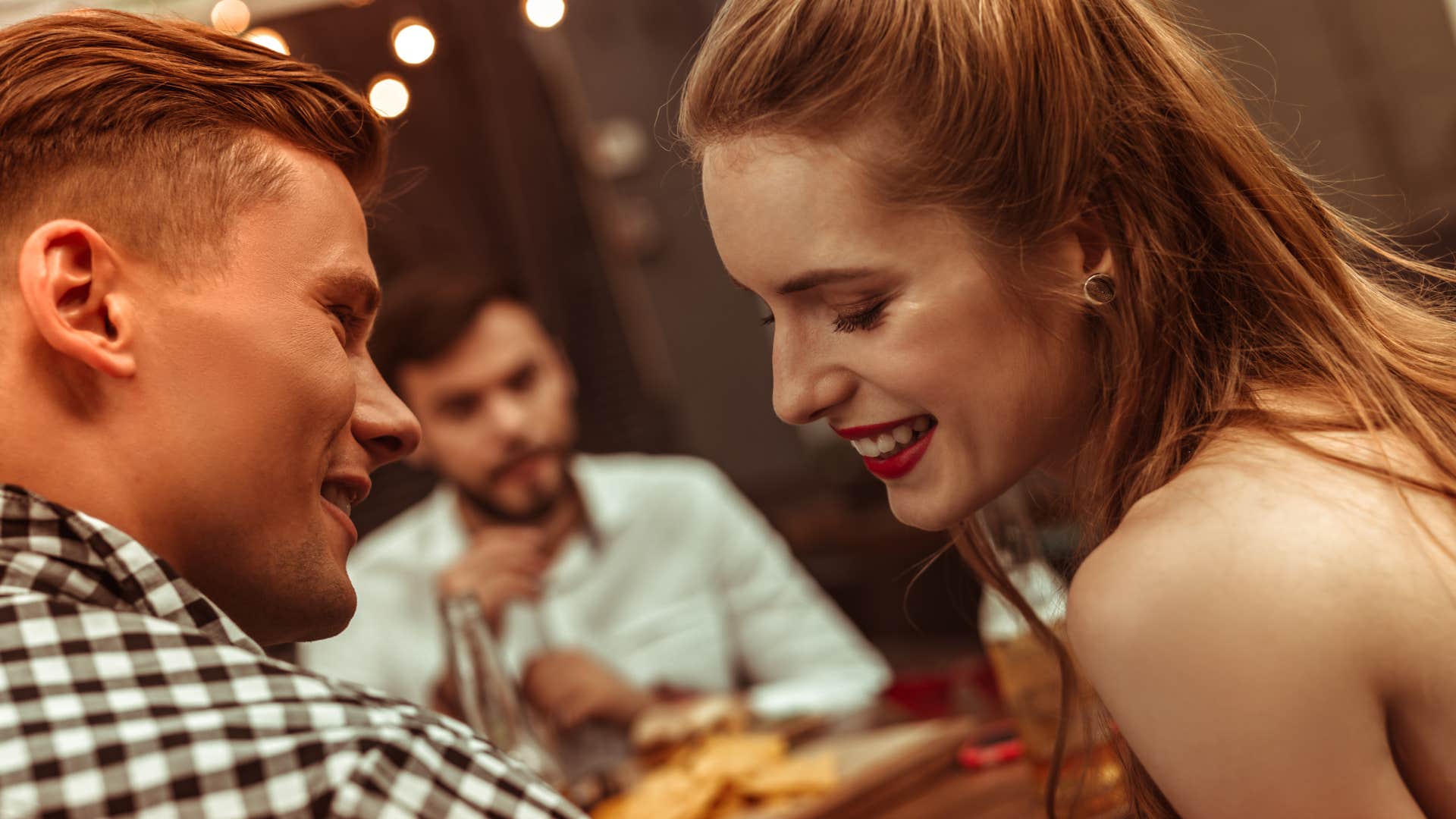 woman with high-level charisma as she captivates man