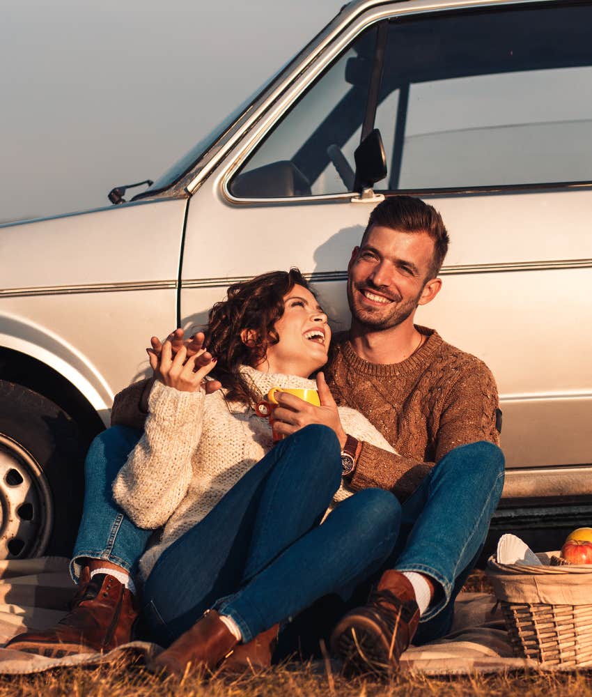 happy couple share roadside picnic showing little things hold them together