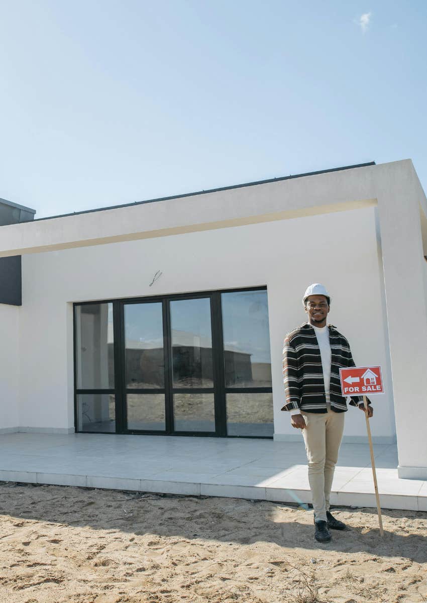 builder showing off a house for sale