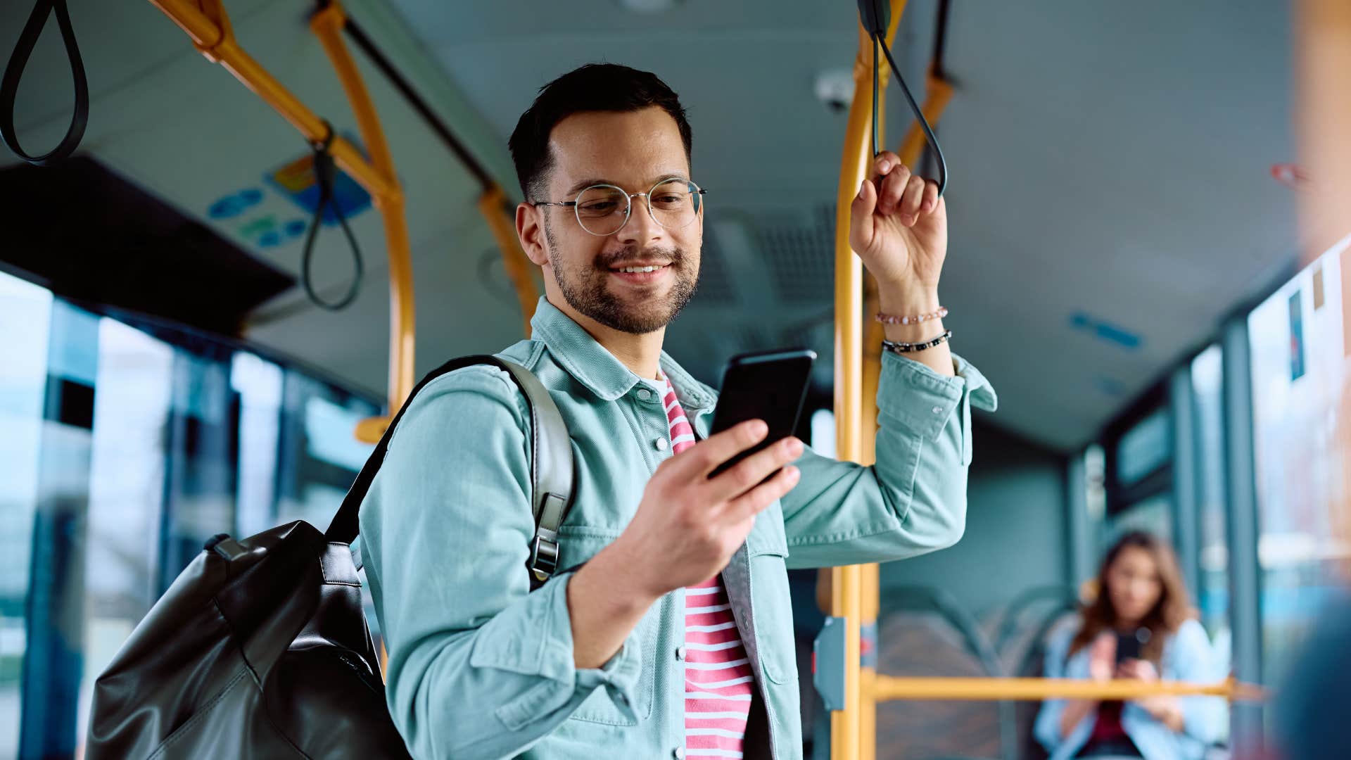 man on the bus texting wife 