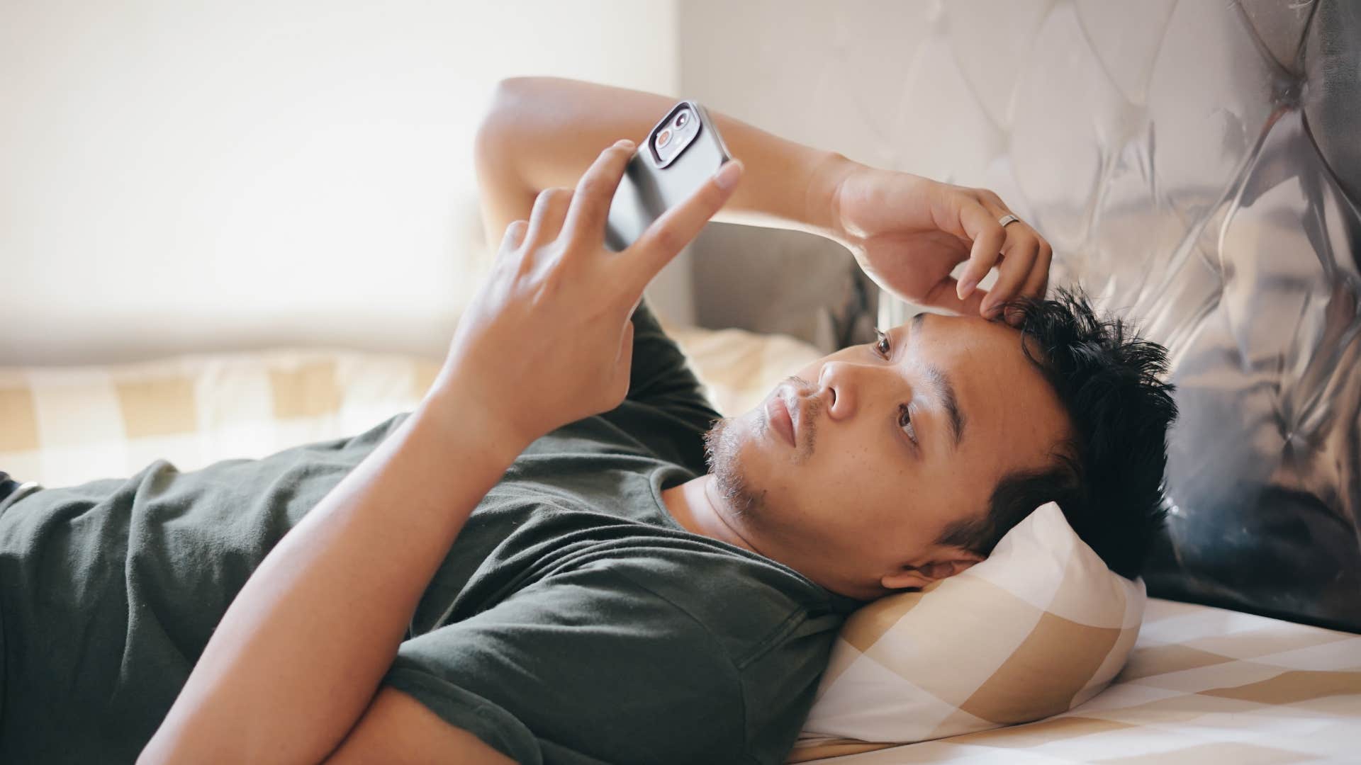 man spending too much time on his phone