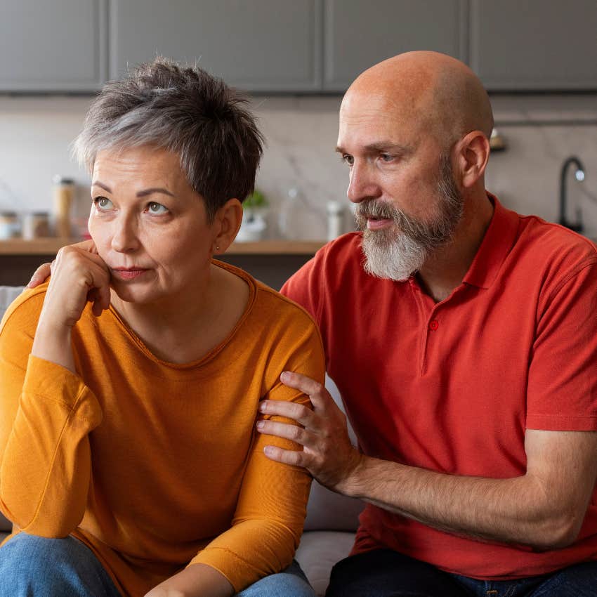 Man saying "I'm really sorry" to his wife.