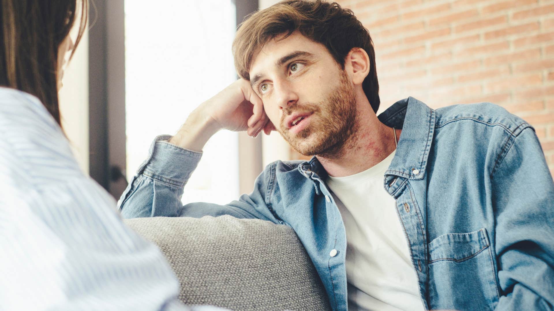 man saying I'm just being realistic during conversation with wife