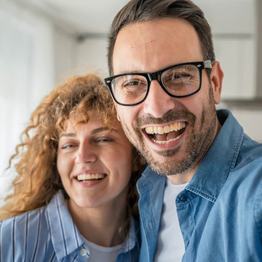 man who cares to be known smiling with his wife