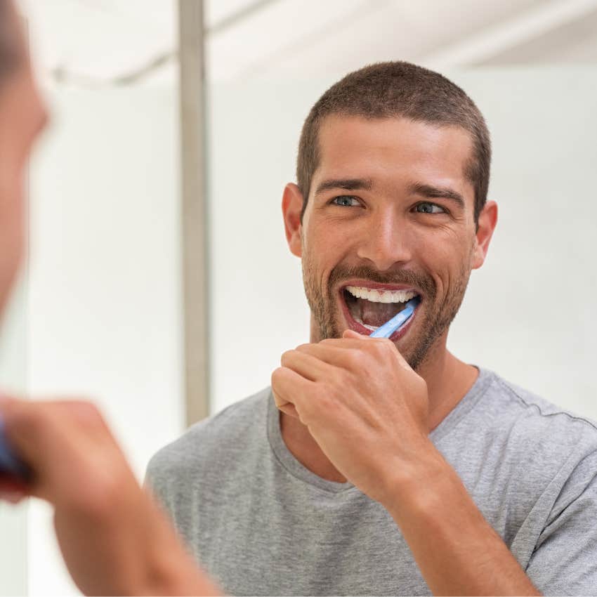 man who goes to bed at the same time every night brushing his teeth