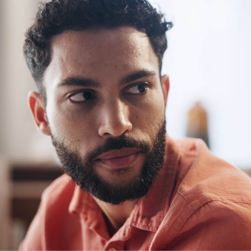 serious man saying I need to get through this to his wife