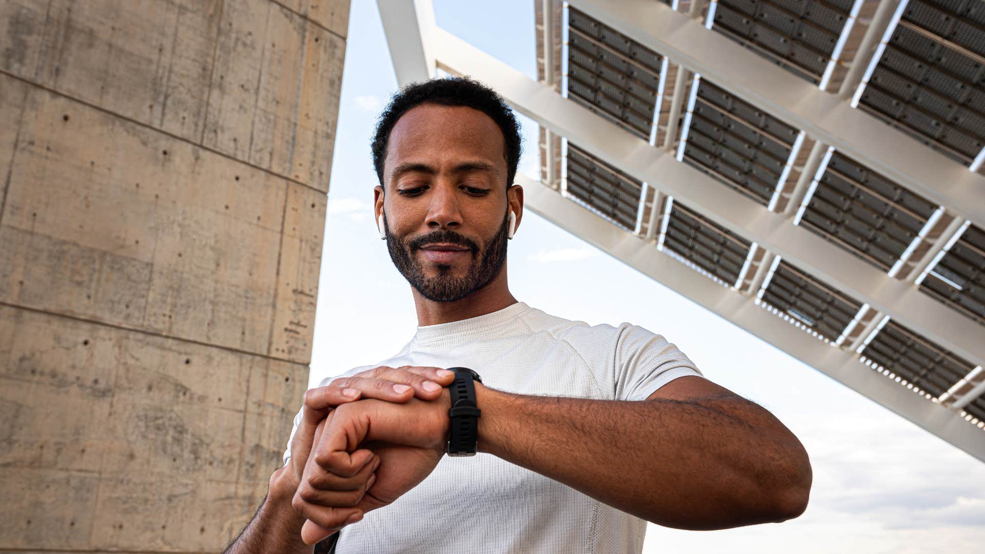 man looking at his watch