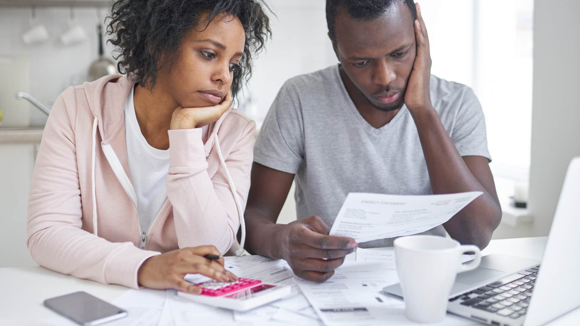 couple having a conversation about bills