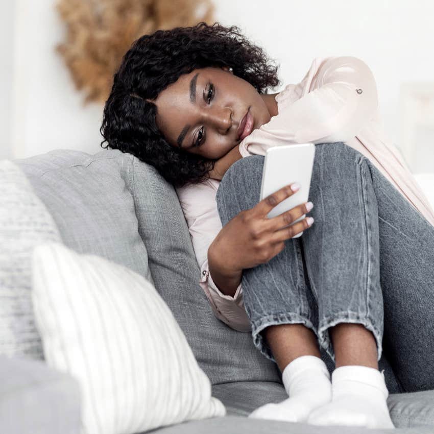 woman with man who only feels friendship as he rarely calls or texts