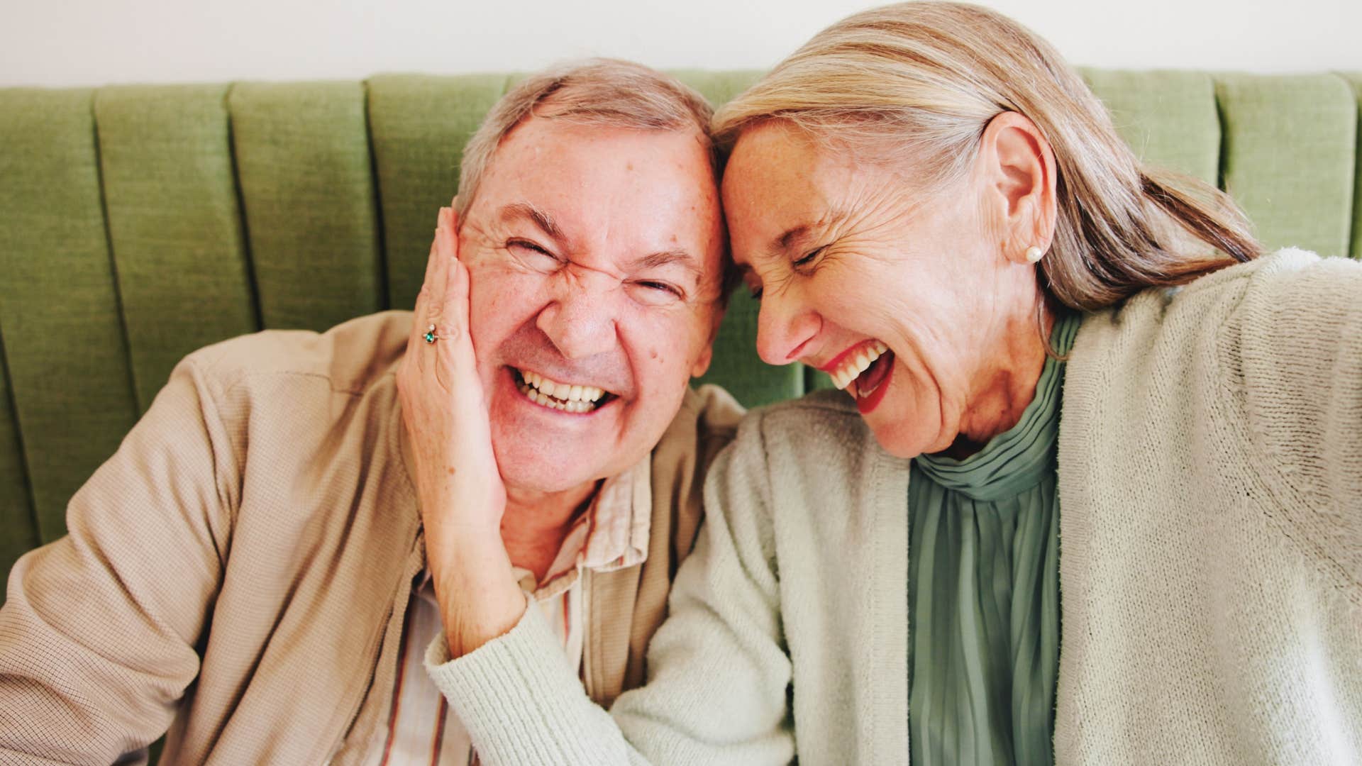 couple laughing together happily