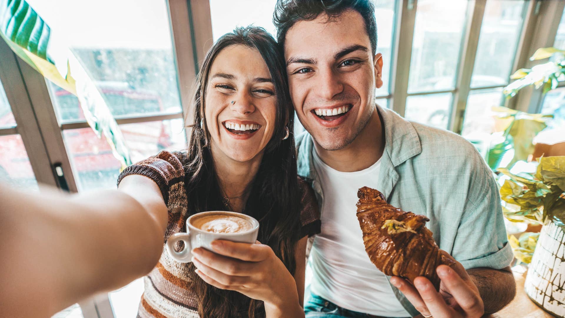 couple trying new breakfast spot together smiling