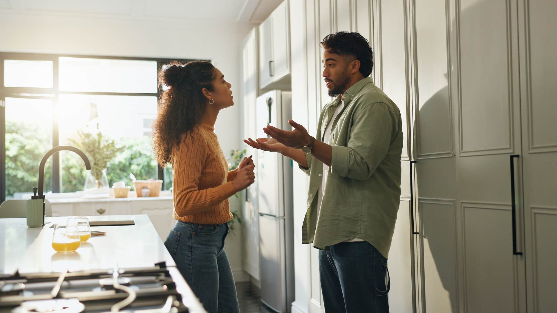 man yelling at woman telling her she cant wear that