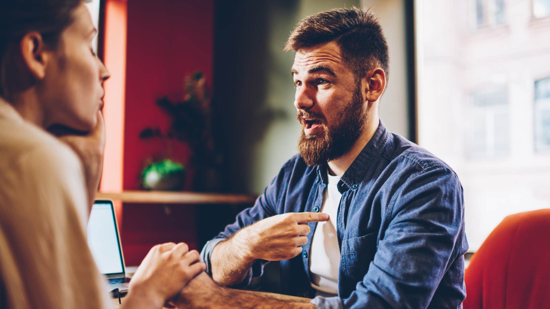 man yelling at woman saying shes lying