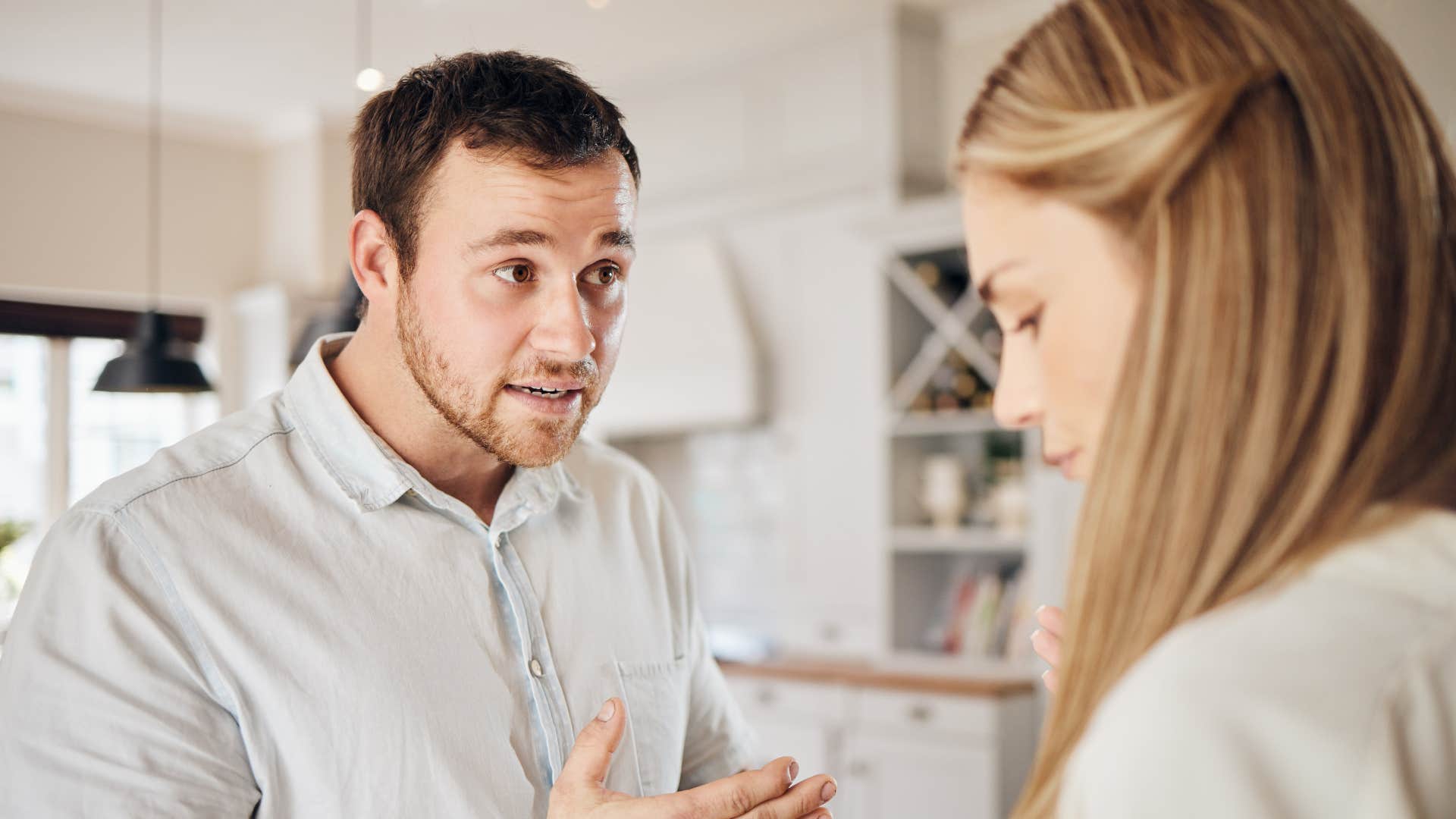 man confronting wife saying he shouldnt have to ask 