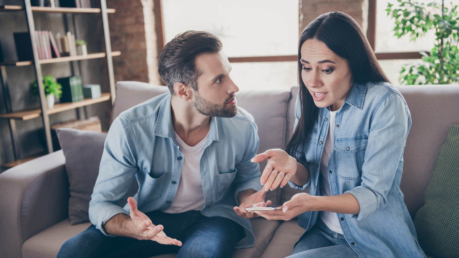 man yelling at woman saying why would you do that