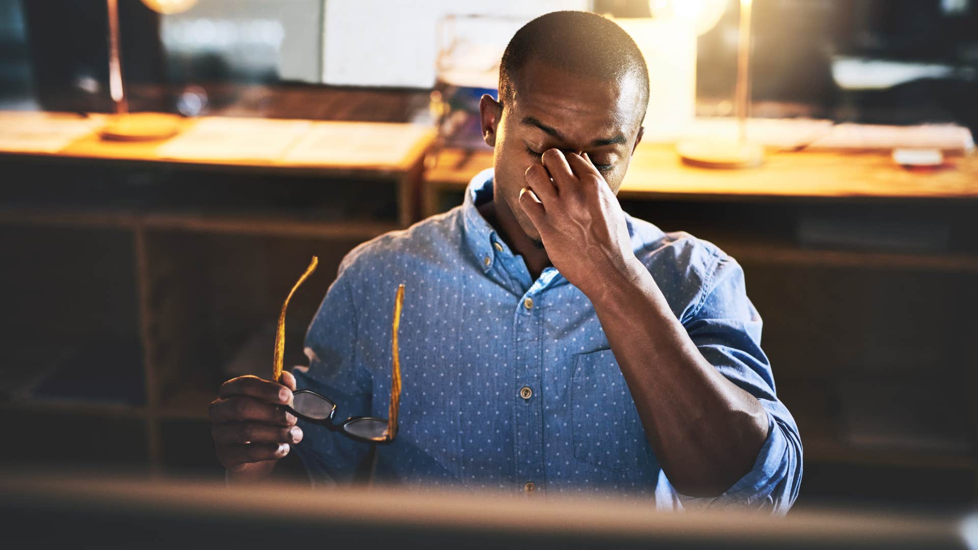 stressed man whose self-worth is tied to his job