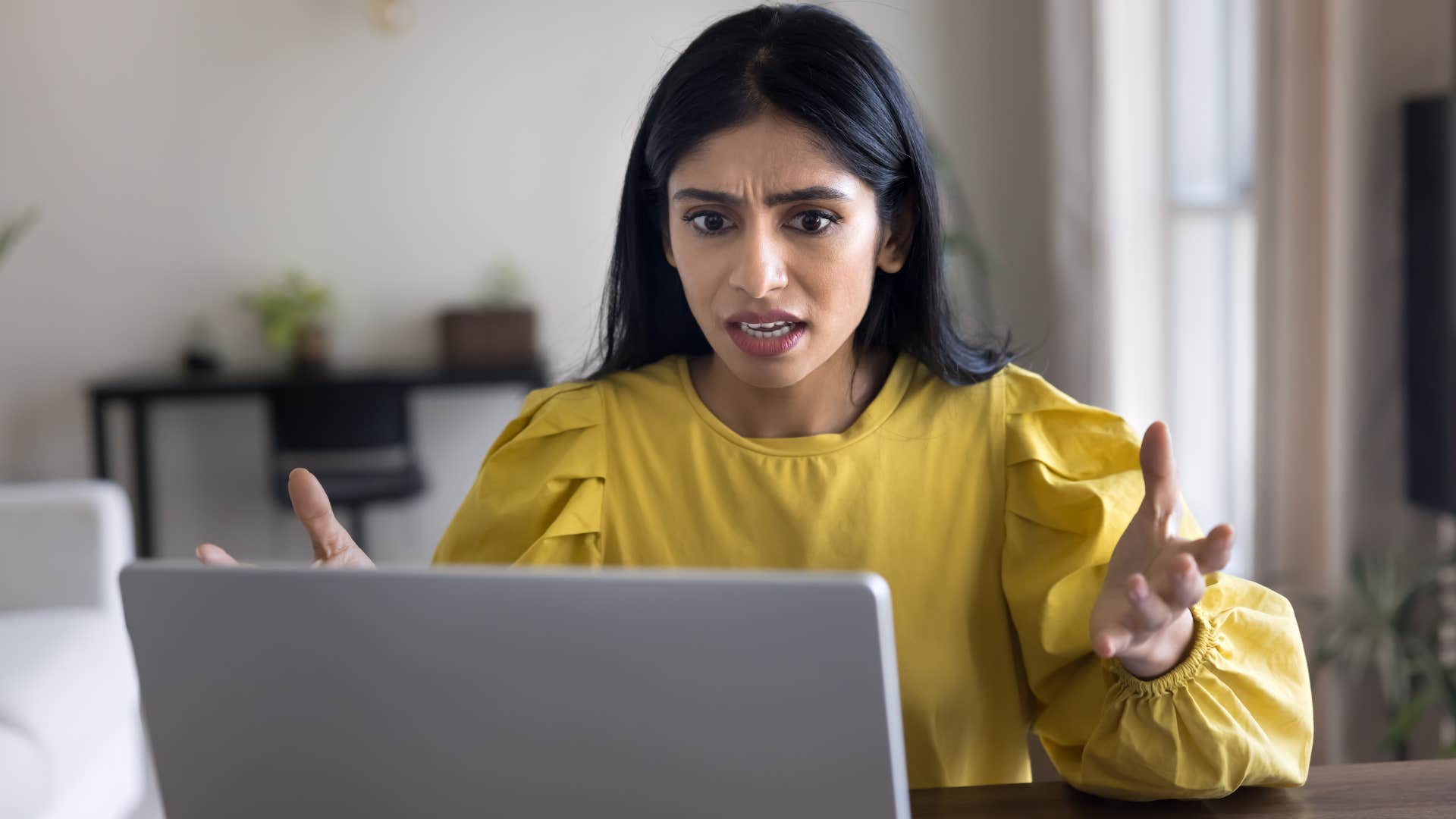 stressed woman working while stuck in fight or flight mode
