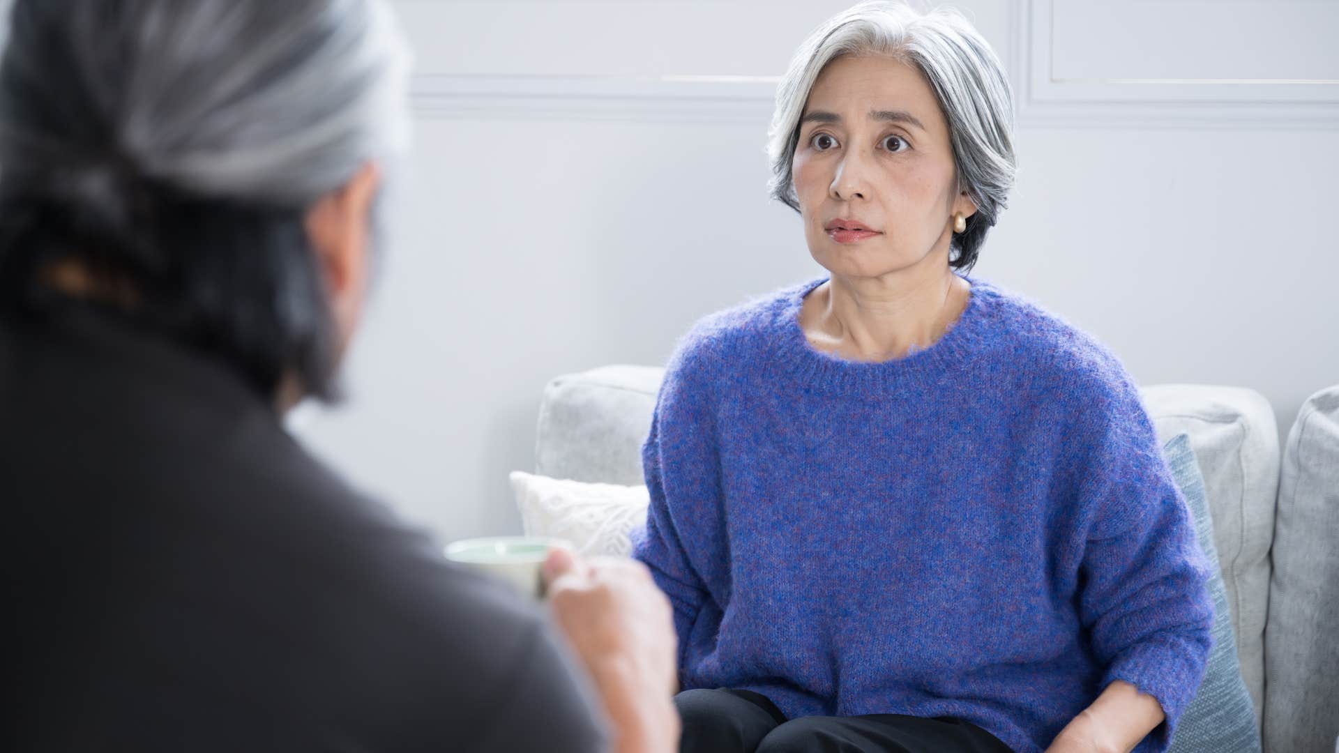 woman saying you can believe whatever you want to her partner