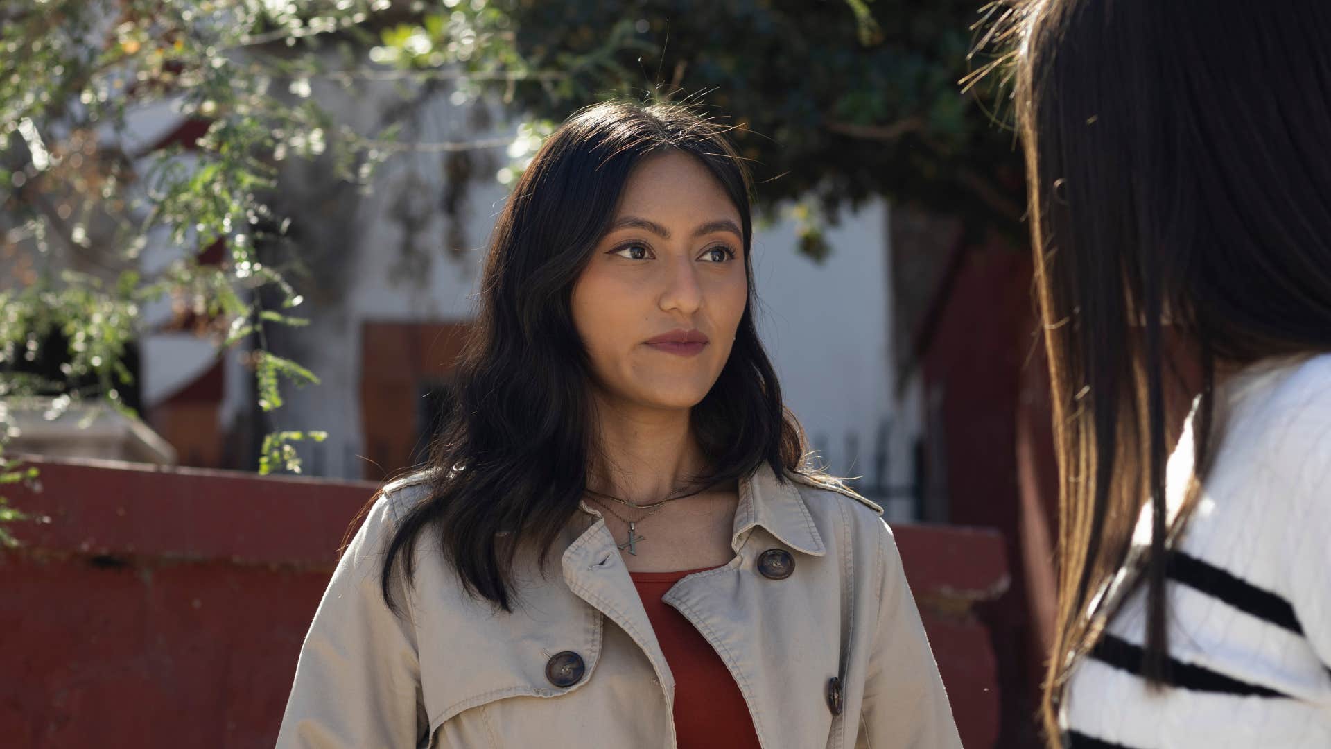 passive-aggressive woman listening attentively to friend