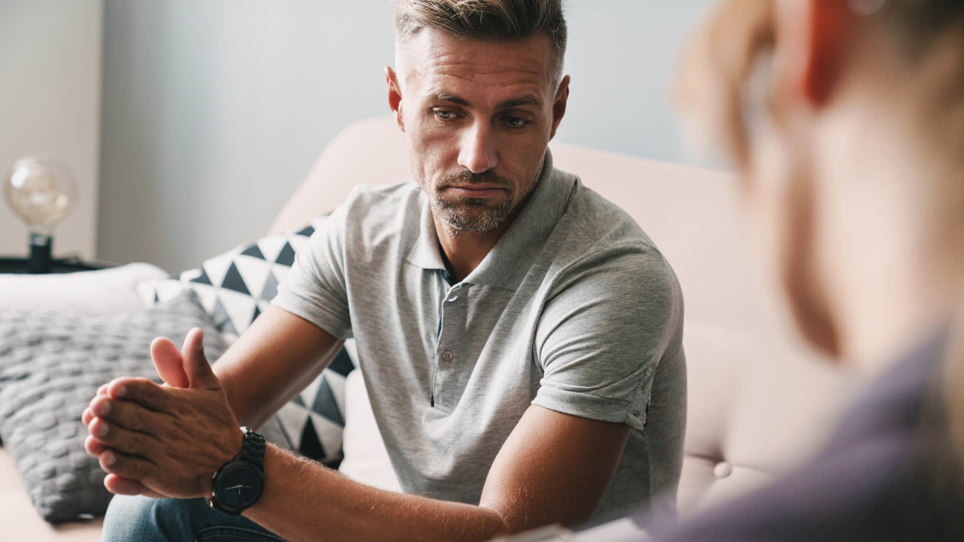 passive-aggressive man having conversation with therapist