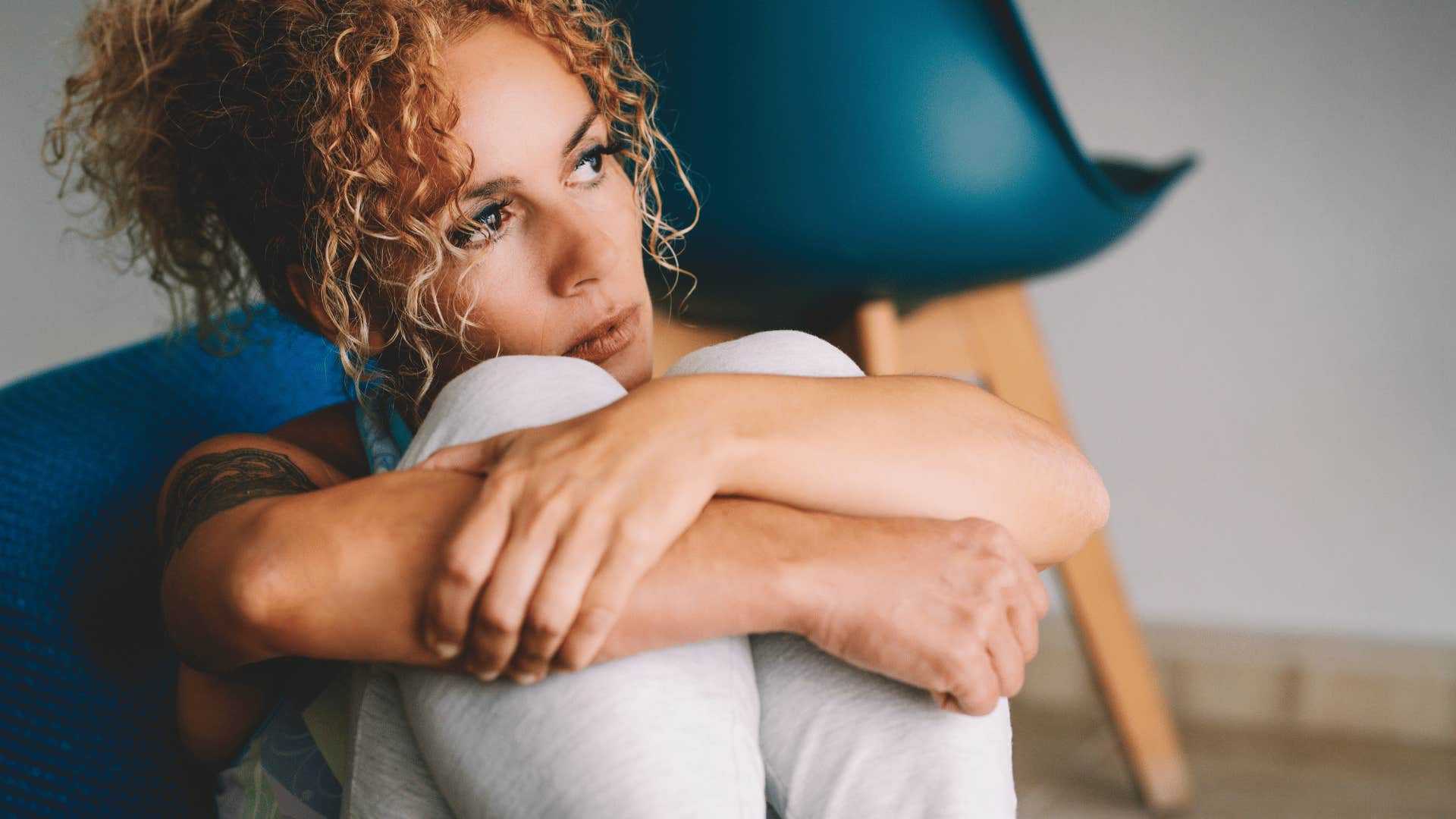 woman who is secretly embarrassed about her life saying she doesn't want to talk about it