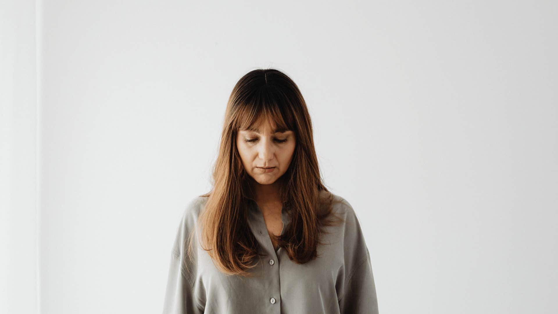 woman who is secretly embarrassed about her life saying she's just tired