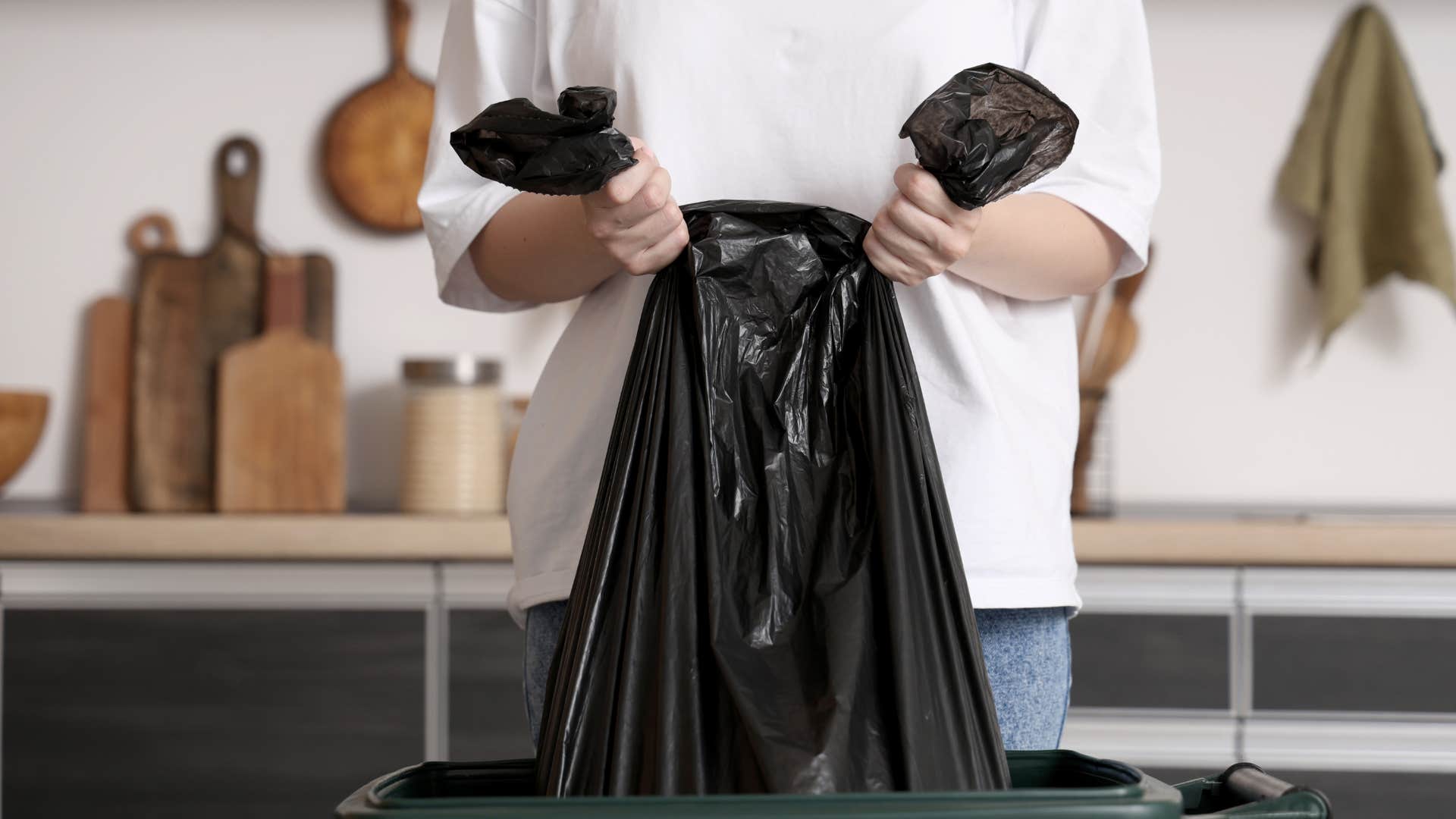 person taking out the trash