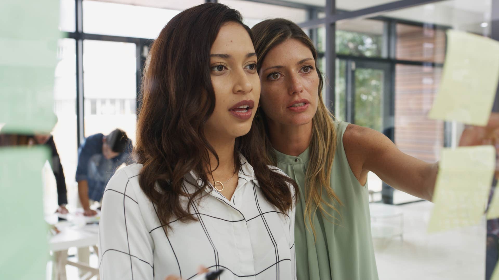 two women working on task