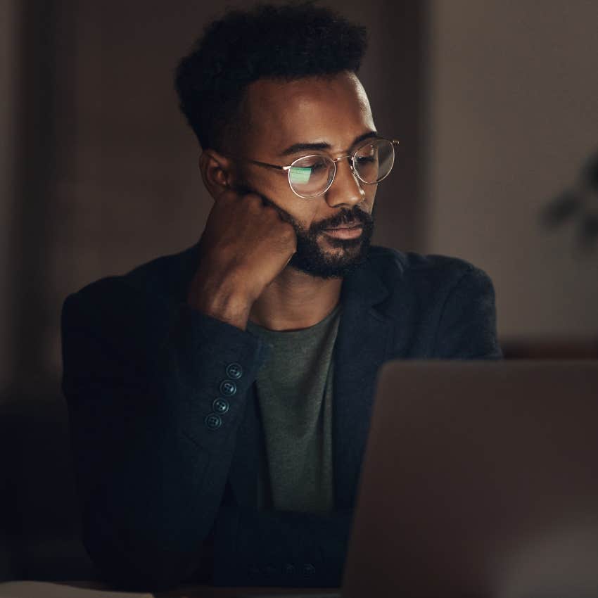 man who has a separate routine from his partner working late