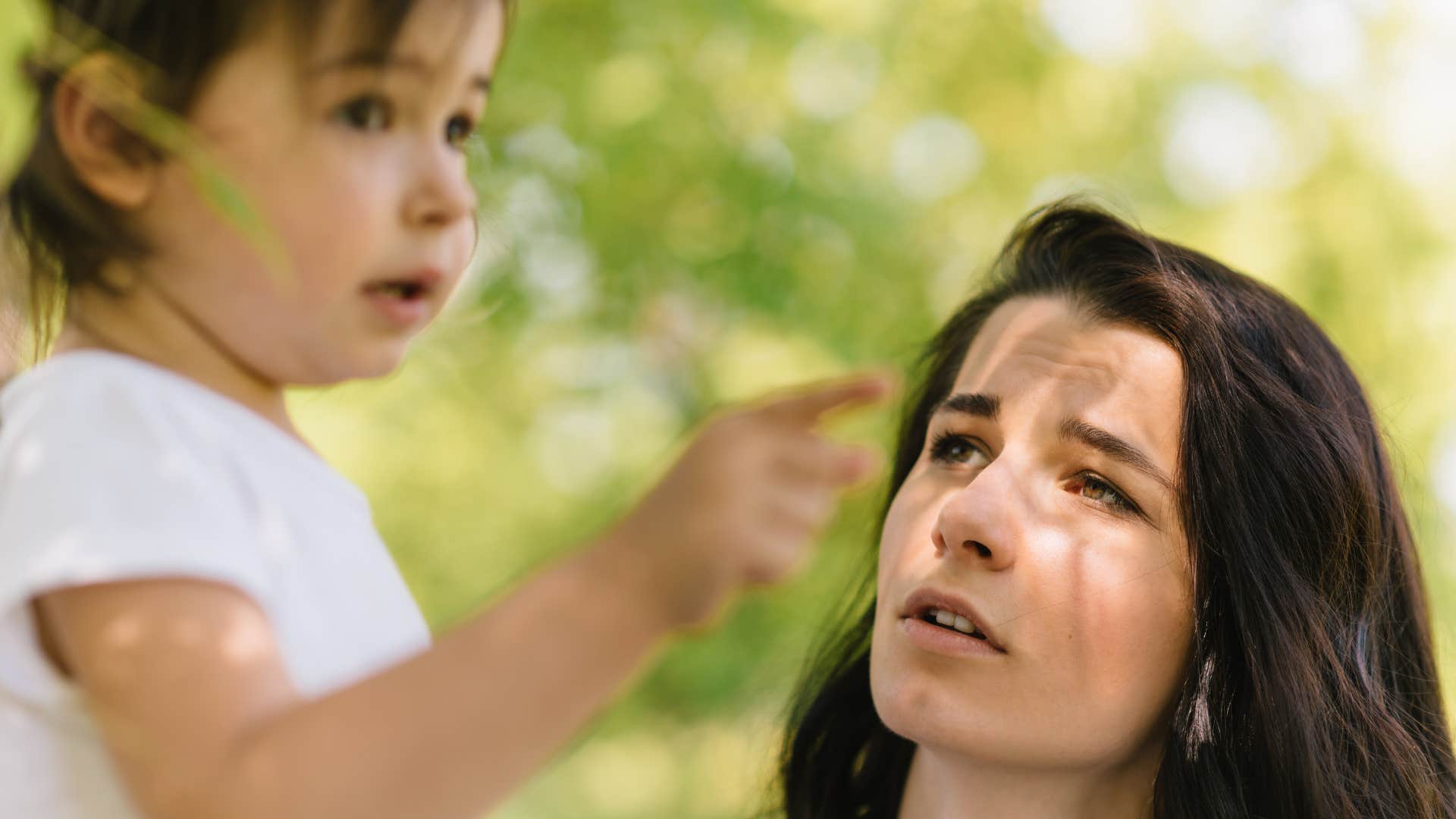 worried mom looking at daughter