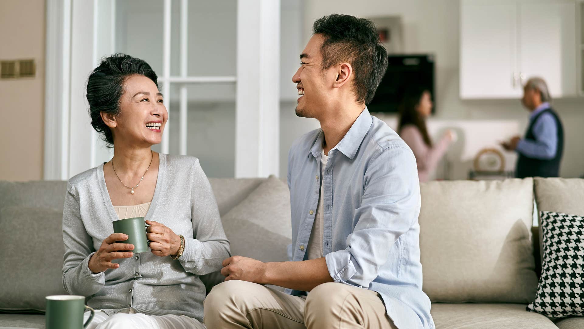 mom laughing with adult son