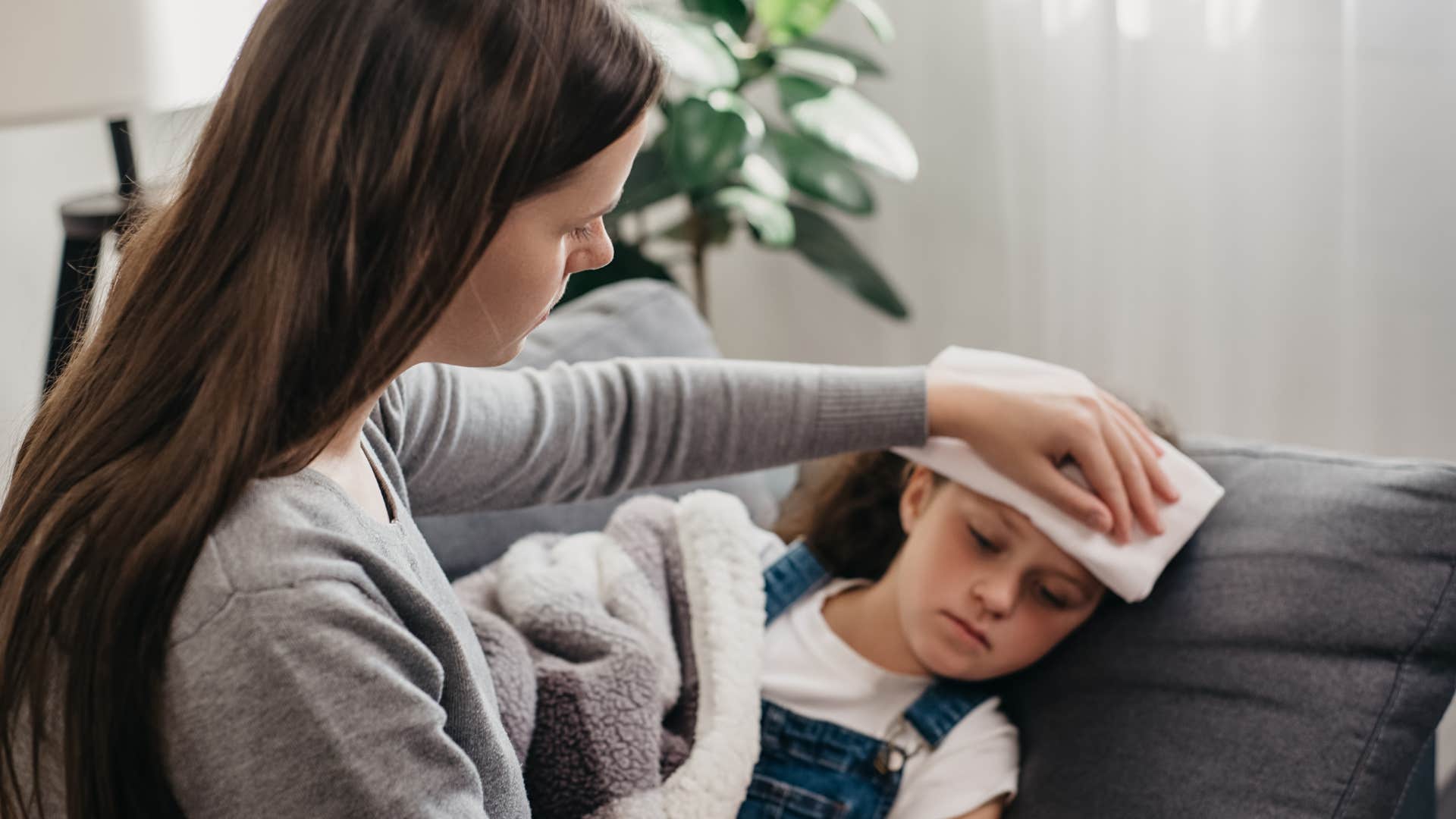 mom taking care of sick kid