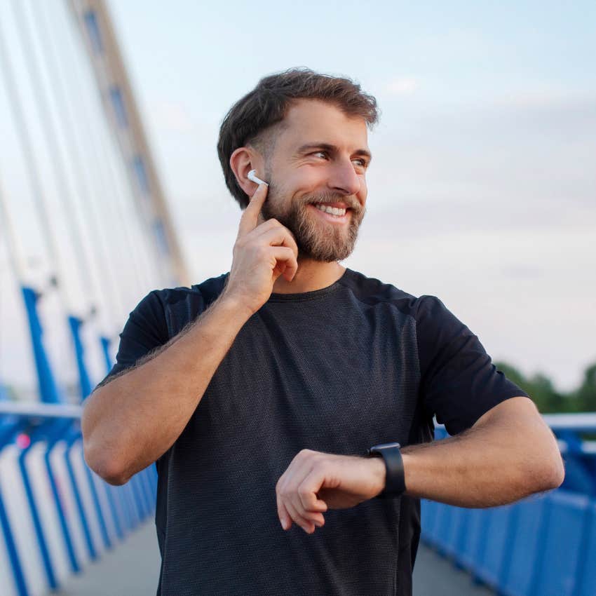 Man who makes time for productive hobbies running outside.